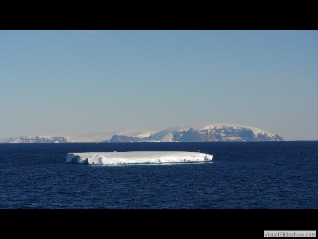 040 Tabular berg, Fridtjof Sound, Antarctic Peninsula in background